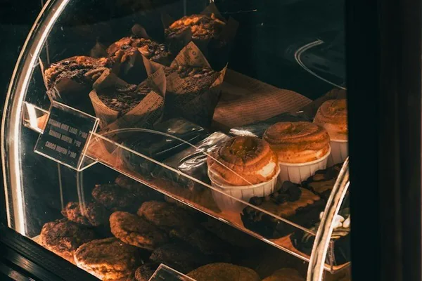 Glass display case of freshly baked pastries
