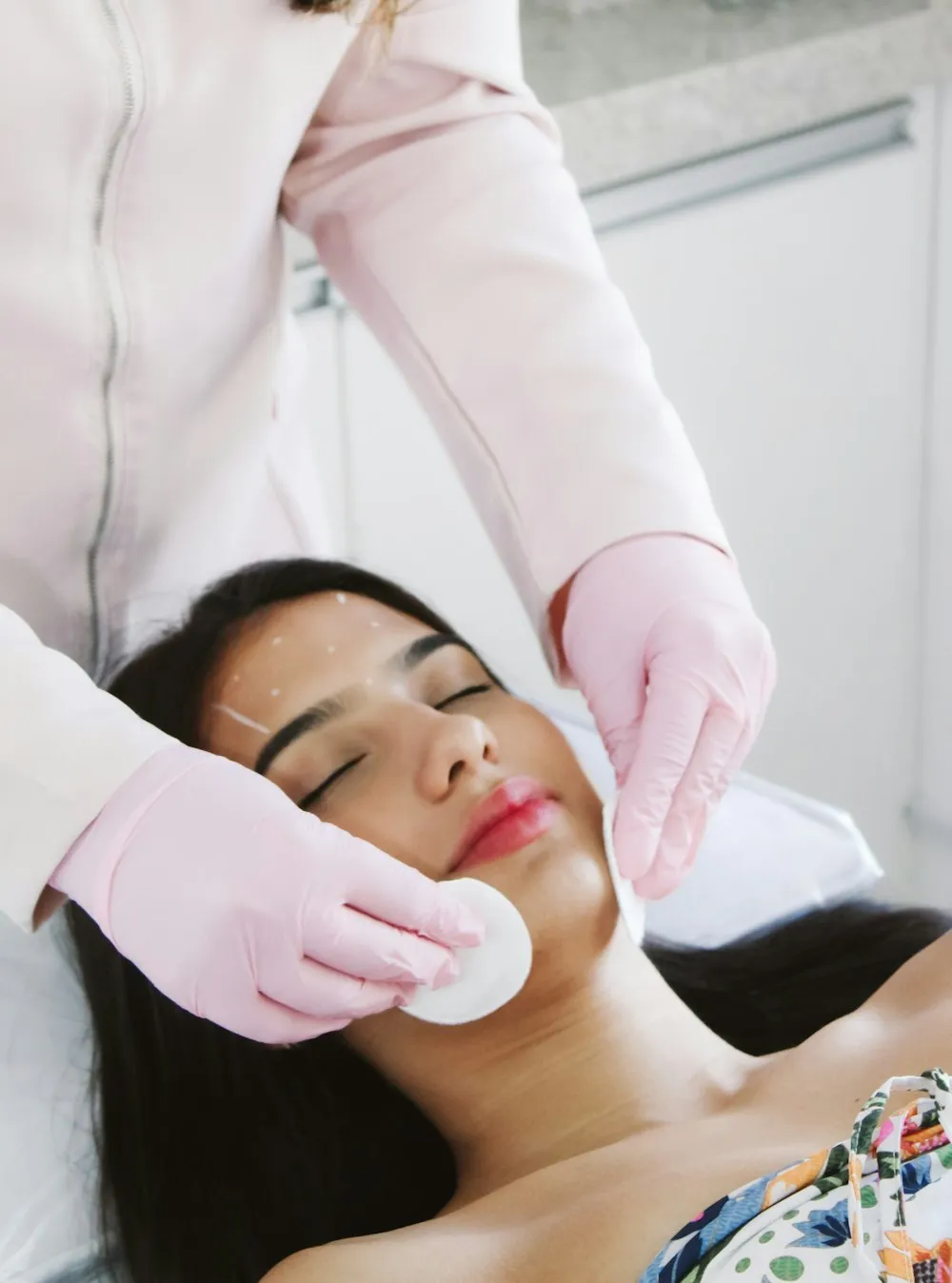 Facial mask being applied